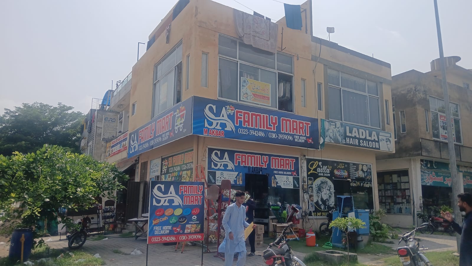 SA Family Mart storefront building, Block B, Citi Housing, Jhelum